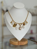 Collar dorado dijes grandes de mar - collares Mundo Chic