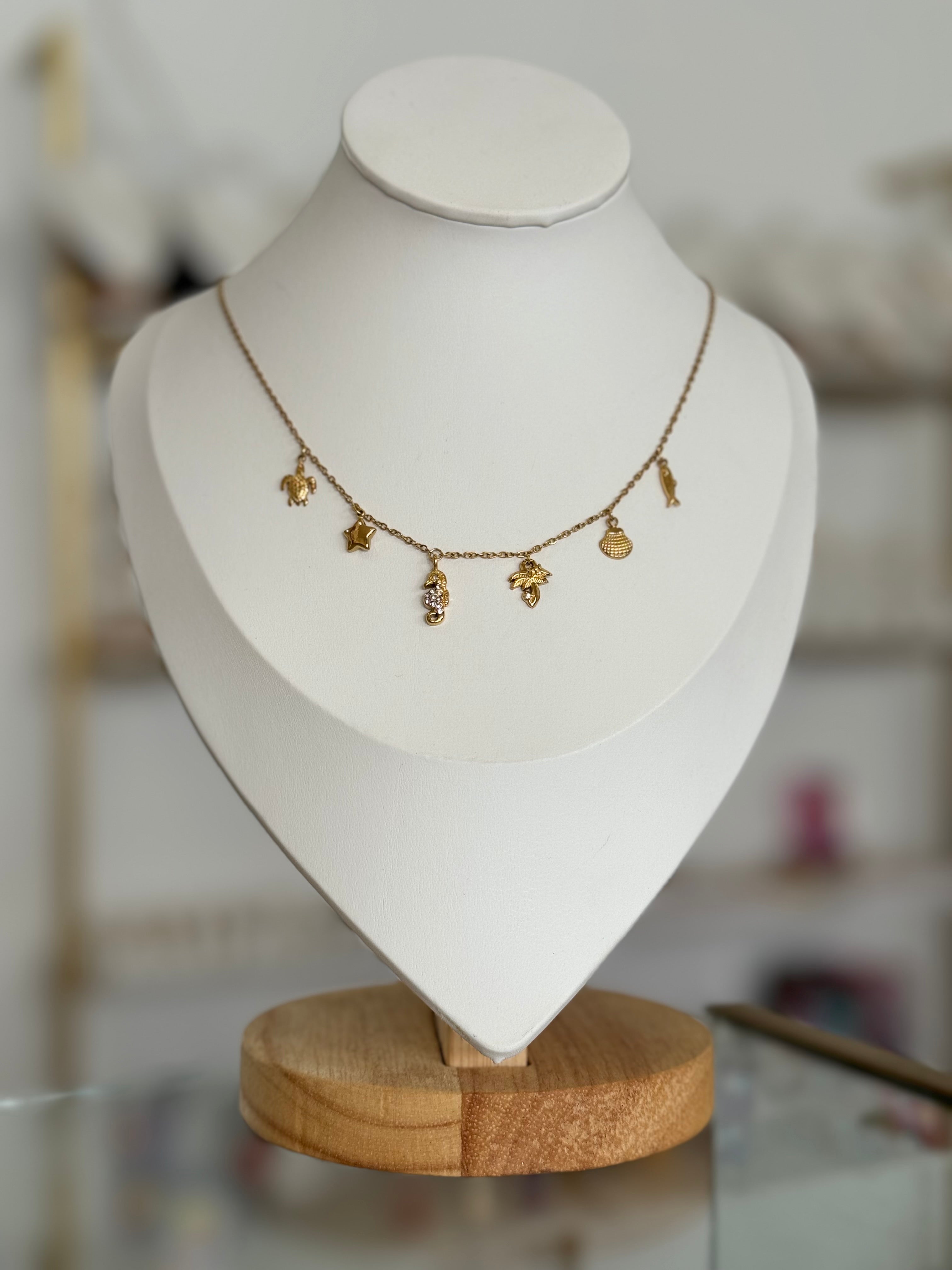Collar dorado dijes mini de mar - collares Mundo Chic