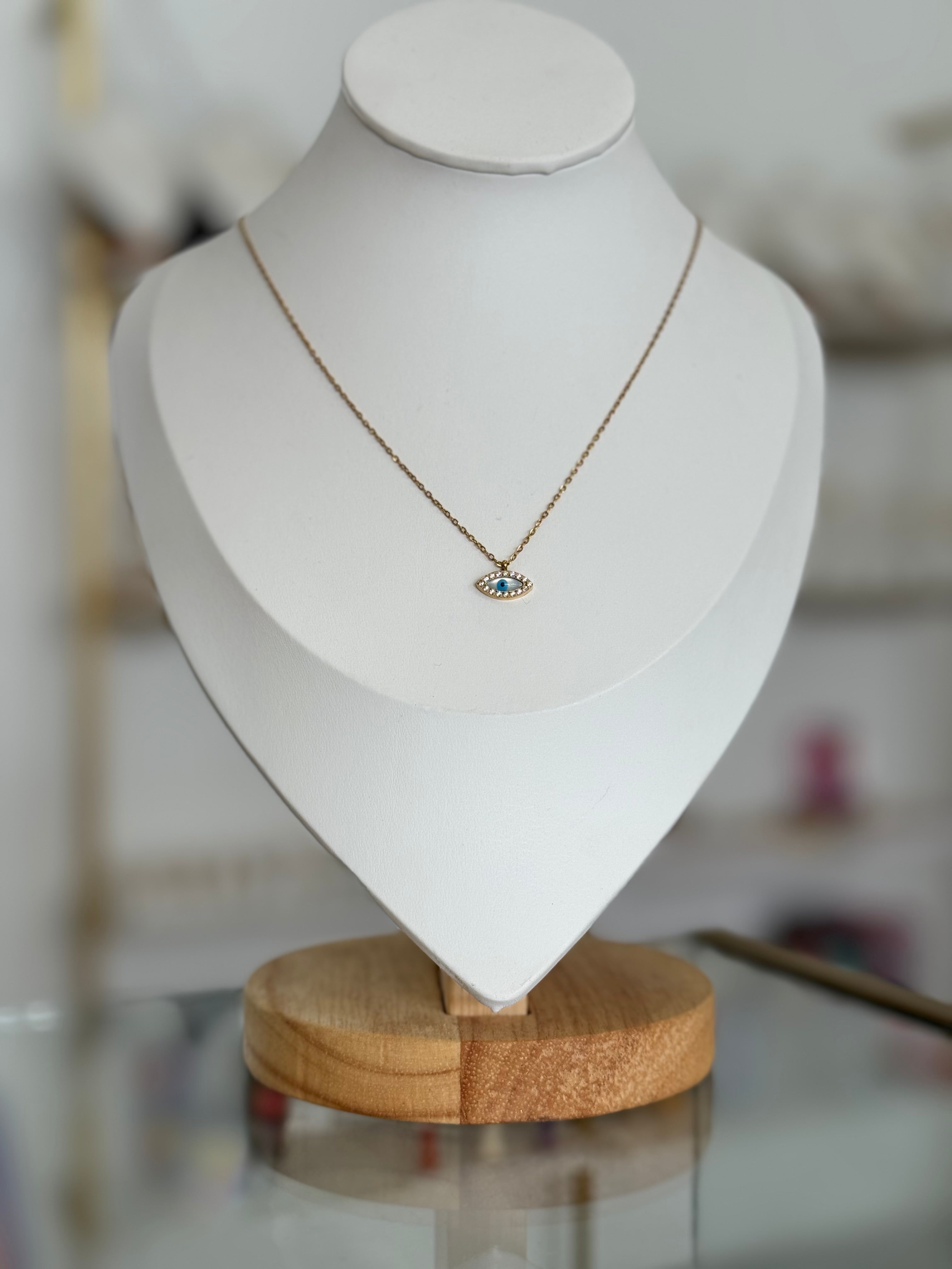 Collar dorado con dije de ojo mini - collares Mundo Chic