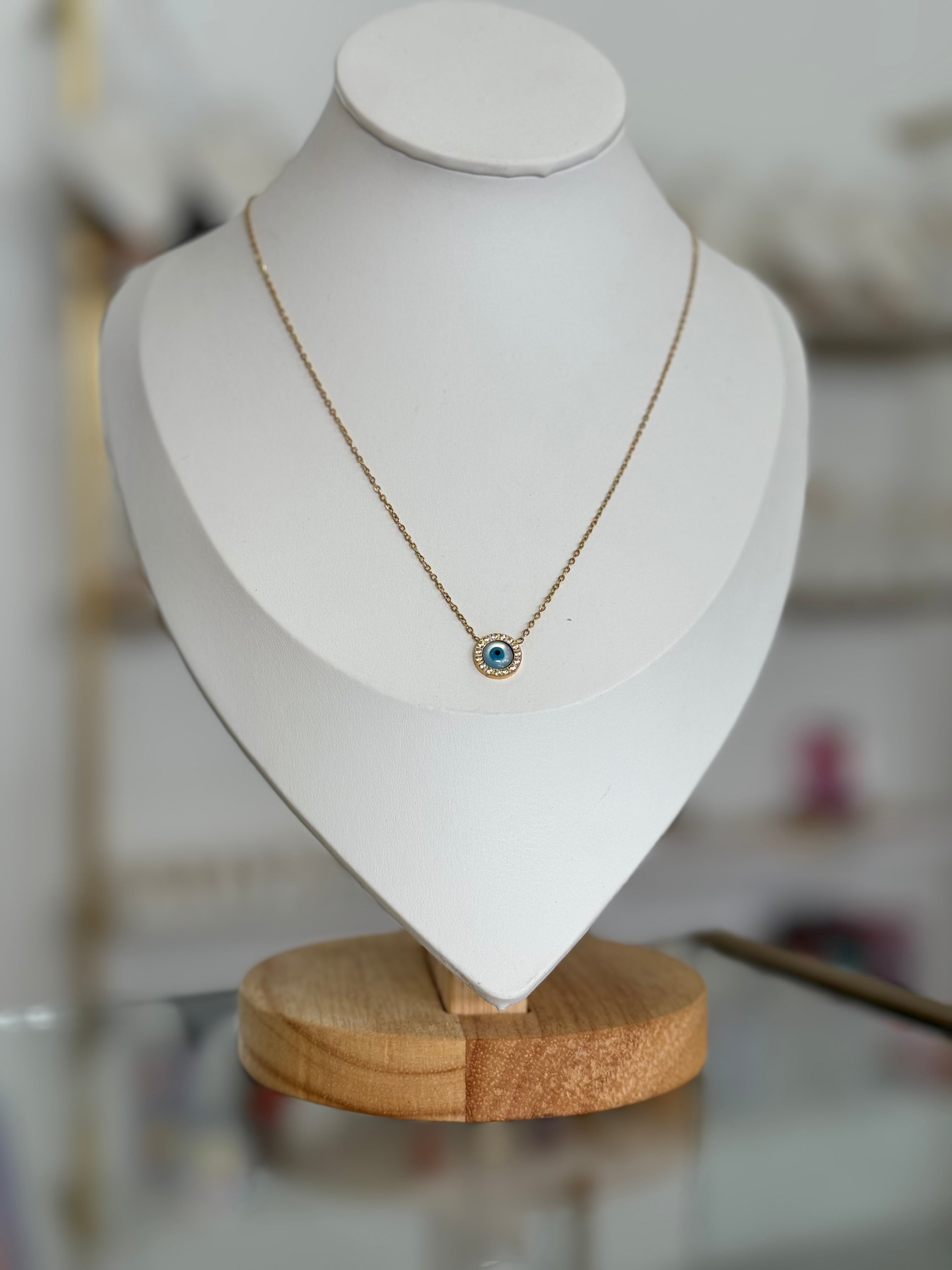 Collar dorado con dije de ojo con circonias - collares Mundo Chic