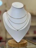 Collar triple, cadena snake, bolitas y dije mini de zirconia. - collares Mundo Chic