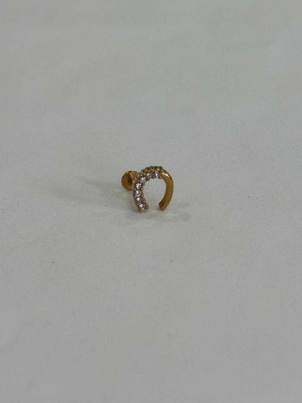 Herradura con zirconias. Piercing labret de acero quirúrgico 316L - piercings Mundo Chic