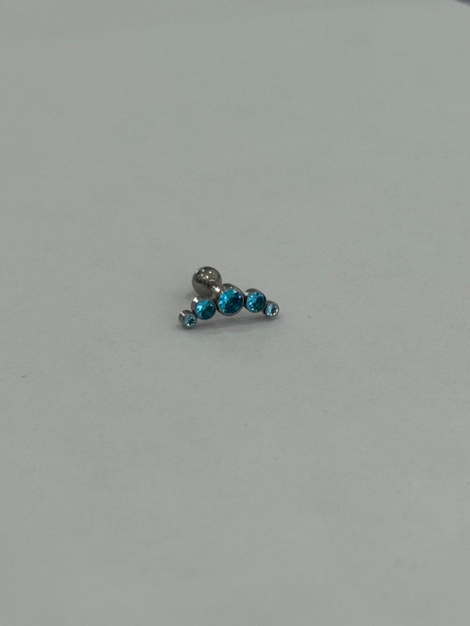 Arco con zirconias azules. Piercing de acero quirúrgico 316L - piercings Mundo Chic